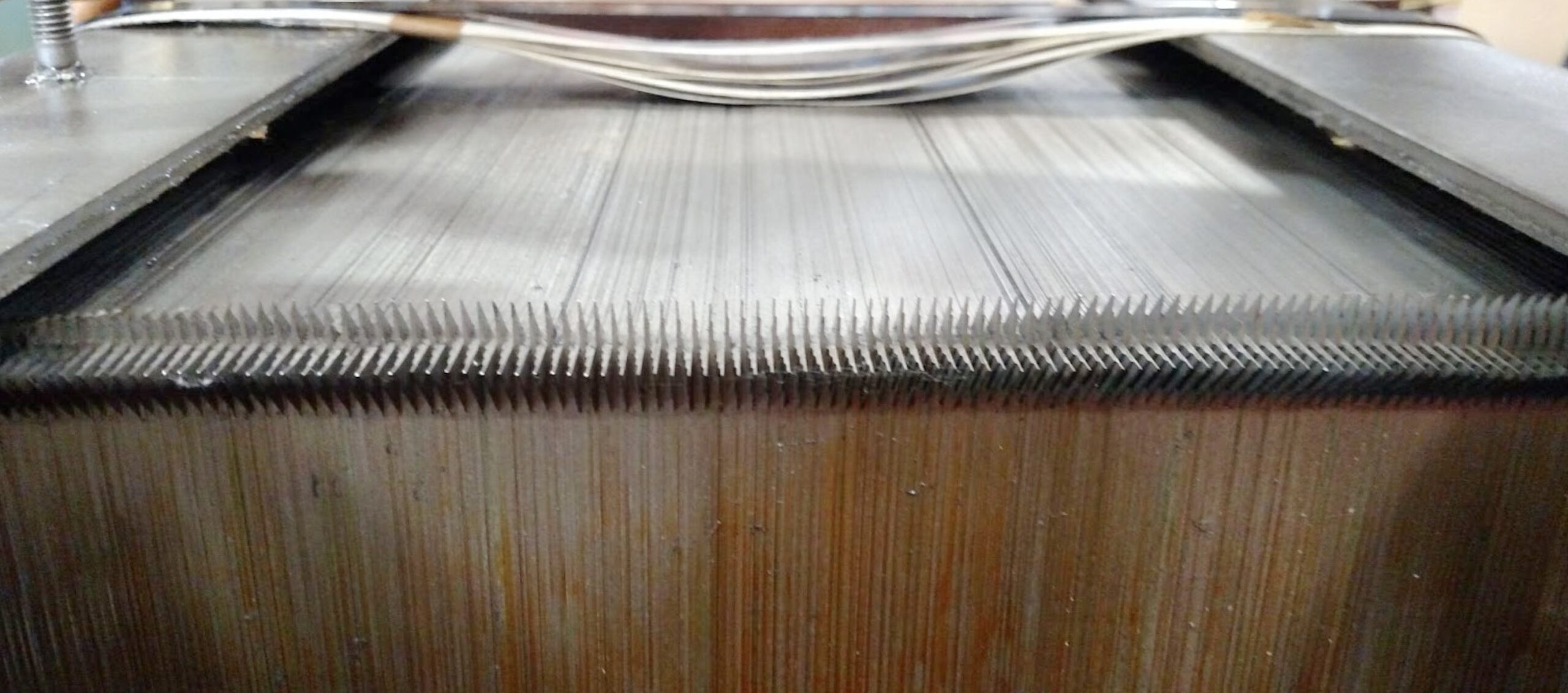 A laminated core showing the step-lap mitred edge